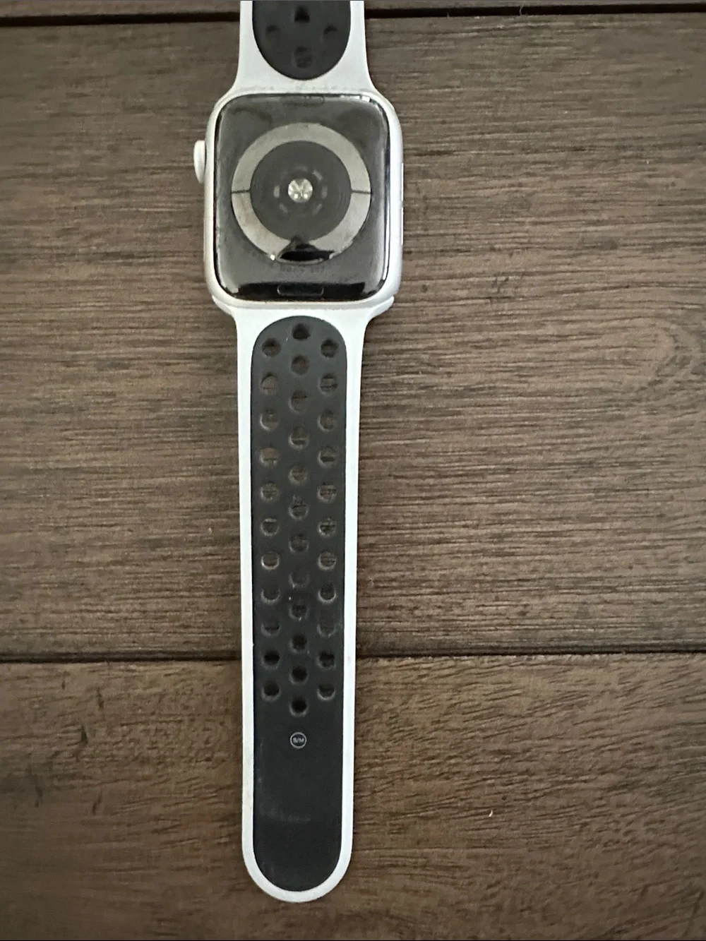 Apple Watch with White Perforated Sport Band. Nike addition series 5